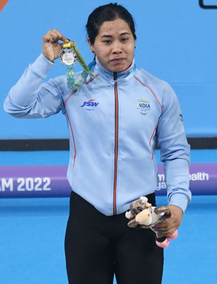 Birmingham : Bindyarani Devi won India a fourth medal on a successful day at the Commonwealth Games weightlifting arena in Birmingham, bagging a silver medal in the Women's 55 kg weight class. (Photo: Subir Halder/IANS)