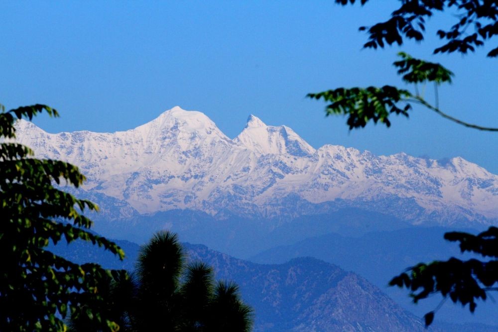 Chamba : A view of hills covered in snow in Chamba on Sunday, November 20, 2022. (Photo:IANS/Rameshwar Gaur)