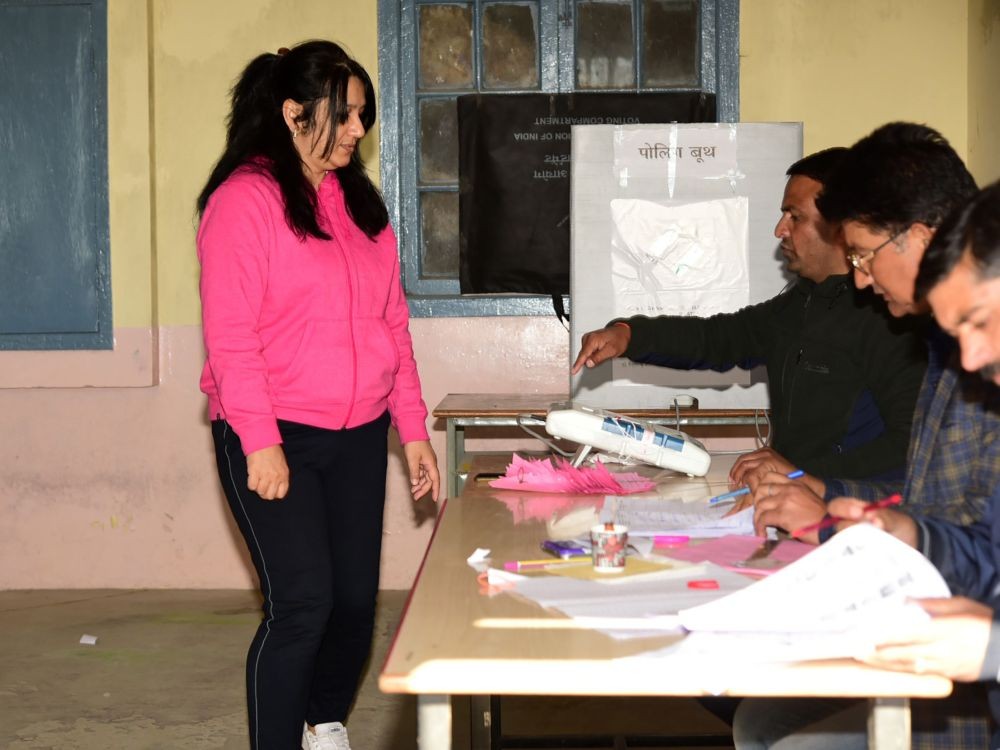 A voter being registered his name to cast his vote, at a polling booth, at Govt. Senior Secondary School, during Shimla, Himachal Pradesh Assembly Election, on November 12, 2022.