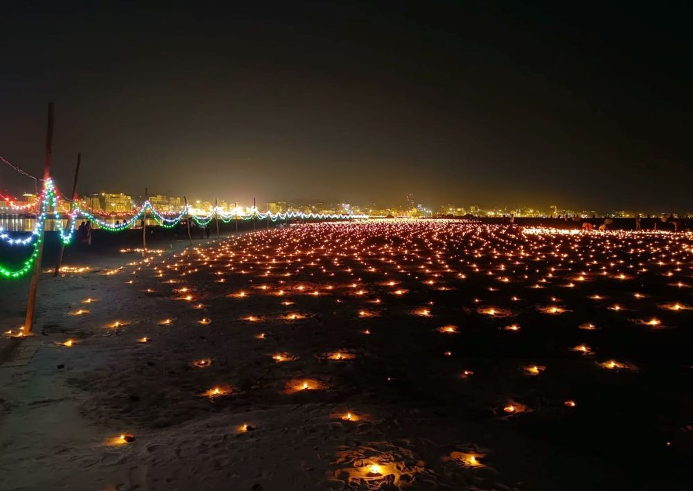Varanasi: Illuminated banks of river Ganga on the occasion of Dev Deepawali in Varanasi on Monday, Nov. 07,2022.(Photo:IANS)