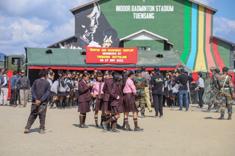 An NCC cadet peers through a binocular during the 28 AR’s equipment display at Parade Ground, Tuensang on November 7. (Morung Photo)