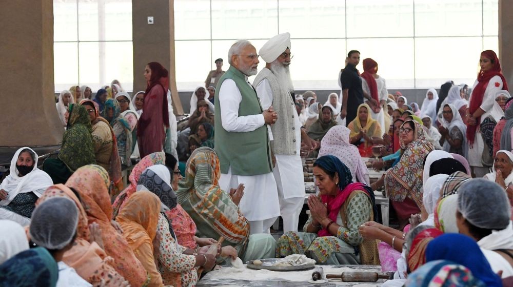 Beas : Prime Minister Narendra Modi with Radha Soami Satsang Beas (RSSB) chief Gurinder Singh Dhillon during his visit to RSSB dera in Beas on Saturday, November 5, 2022. (Photo:IANS/PIB)