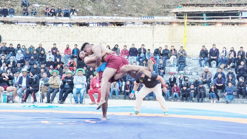 Wrestlers in action at the 15th International Hornbill Naga Wrestling Championship 2022 at Naga Heritage Village Kisama on December 3. (Morung Photo)
