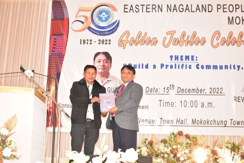 Special Guest Mestubo Jamir, Minister, RD with ENPUM president, Y Among Yim after the release of the ENPUM Golden jubilee souvenir at Town hall, Mokokchung on December 15.