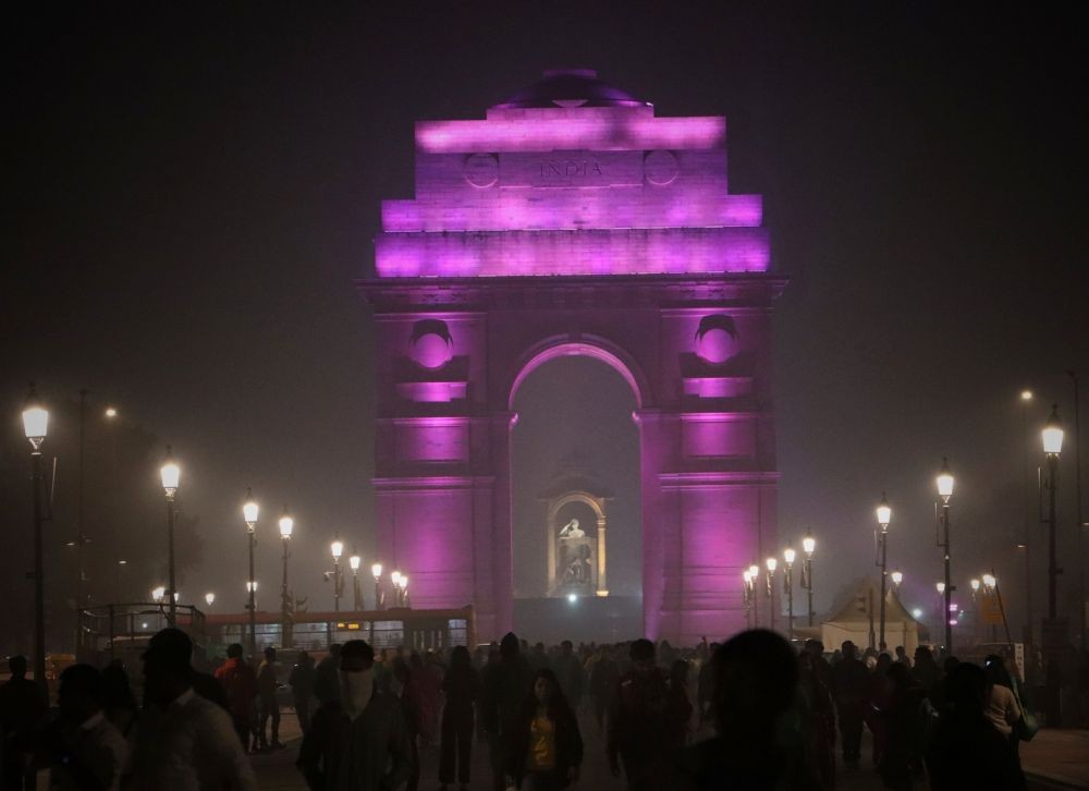 Delhi:India Gate lit up purple to mark the International Day of Persons with Disabilities in New Delhi on Saturday December 03,2022.(Photo: Wasim Sarvar/IANS)