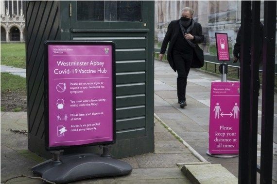 Photo taken on March 11, 2021 shows a man walking out of the COVID-19 Vaccination Centre in Westminster Abbey in London, Britain. (Photo by Ray Tang/Xinhua)