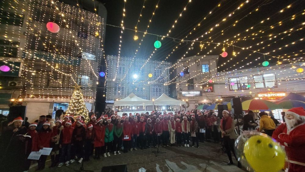The Christian Education Ministry of Kohima Ao Baptist Arogo (KABA) undertakes Children’s Christmas Carol Night during Hornbill Night Carnival Kohima in the main of Town Kohima on December 8. They spread the gospel of Christ, peace and love through songs. (Morung Photo)