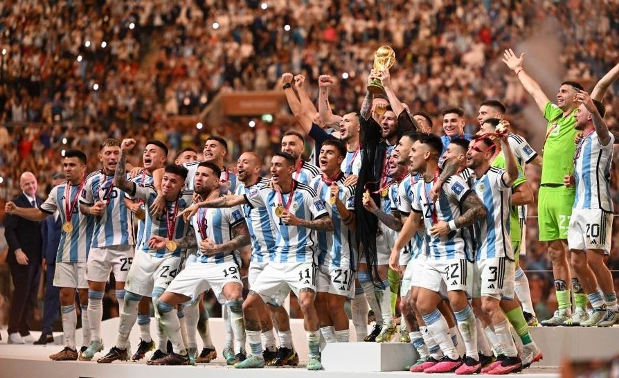 Lusail : Winner Team Argentina celebrate during the awarding ceremony of the 2022 FIFA World Cup at Lusail Stadium in Lusail, Qatar, Dec. 18, 2022. (Xinhua/Li Ga/IANS).