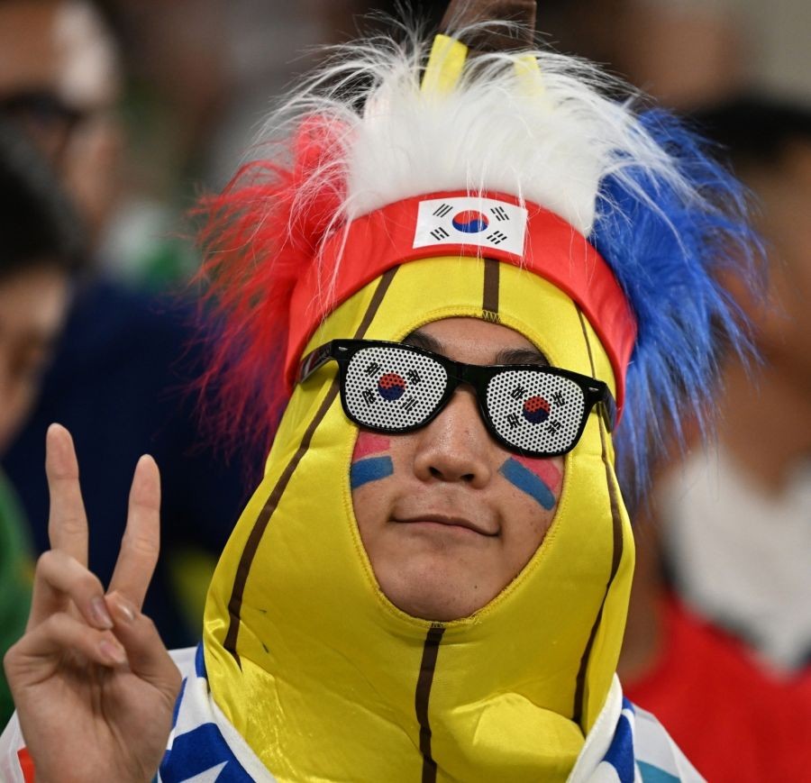 Al Rayyan :A soccer fan awaits the start of the World Cup group H soccer match between South Korea and Portugal, at the Education City Stadium in Al Rayyan , Qatar, Friday, Dec. 2, 2022.(Photo:Suman Chattopadhyay/IANS/Image Solution)