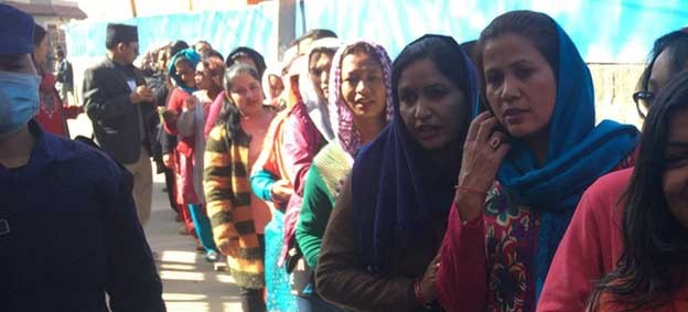 Voters wait to cast their ballots for federal and provincial elections at a polling location in Bhaktapur district, Nepal. Meanwhile, the United Nations marked the annual International Day of Democracy, on September 15, calling on world leaders to build a more equal, inclusive and sustainable world, with full respect for human rights. (Photo Courtesy: UN News)