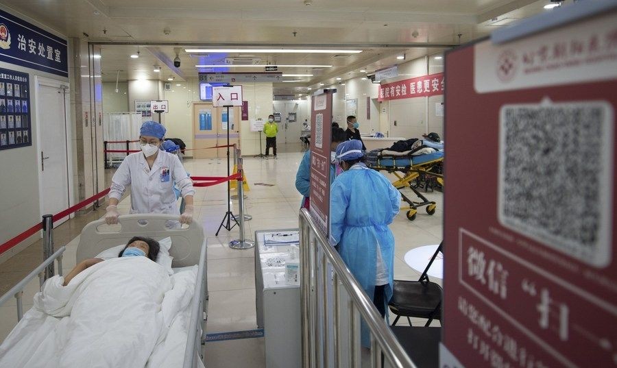 A patient (L, front) is transferred to the dialysis room from the emergency department of Beijing Chao-Yang Hospital in Beijing, capital of China, May 2, 2022. (Xinhua/Chen Zhonghao/IANS)