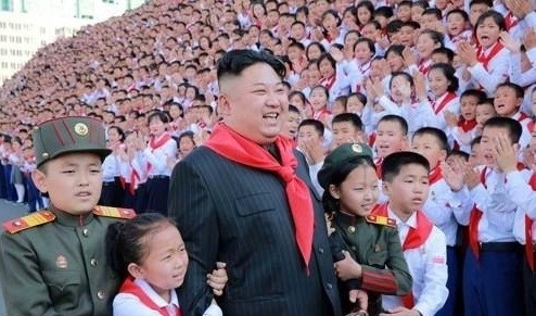 North Korea's leader Kim Jong-un (C) posing for a photo with members of the Korean Children's Union at the organization's 8th congress that month.(Yonhap/IANS)