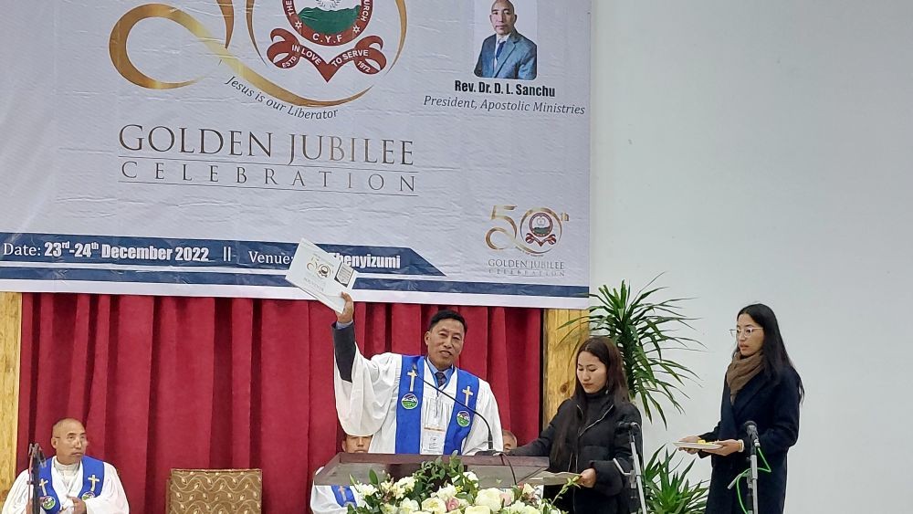 Rev Veshoseyi Rhakho releasing the Golden Jubilee Souvenir on December 23.