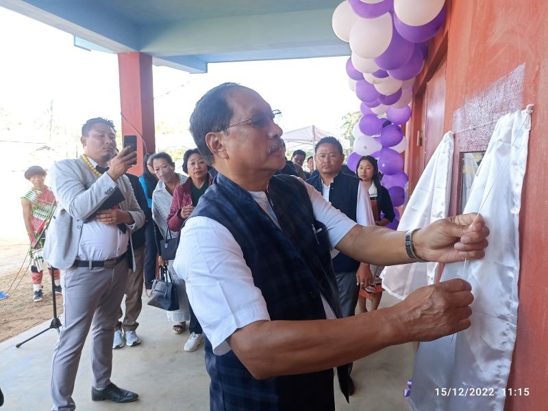 Zhaleo Rio, Advisor, Sericulture, Excise & Minority Affairs, Nagaland, cuts the ribbon at the inauguration of Badminton Indoor stadium-cum-rostrum at Medziphema Village on December 15.