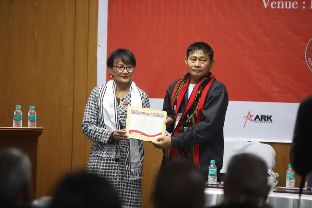 Lanu Aier being felicitated by NSACS on completion of 25 years of living with HIV. (Morung Photo)