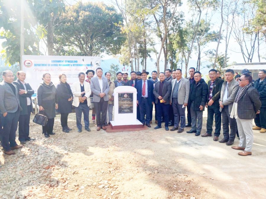 R Khing and others after laying foundation stone for VHC at K Station on December 20. (DIPR Photo)