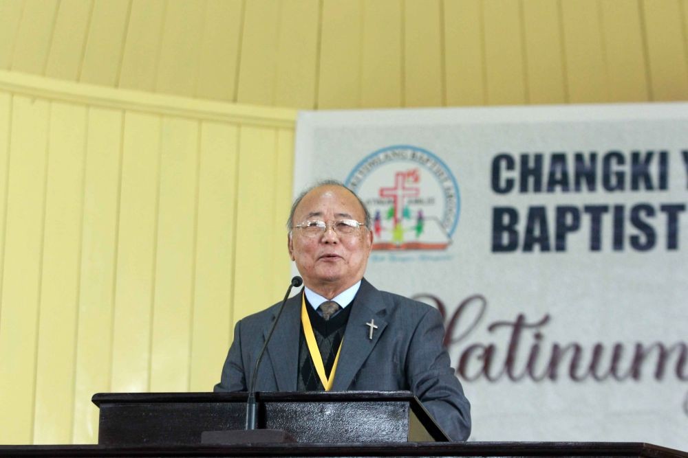 Rev O Alem speaking at the Changki Yimlang Baptist Arogo platinum jubilee celebration.