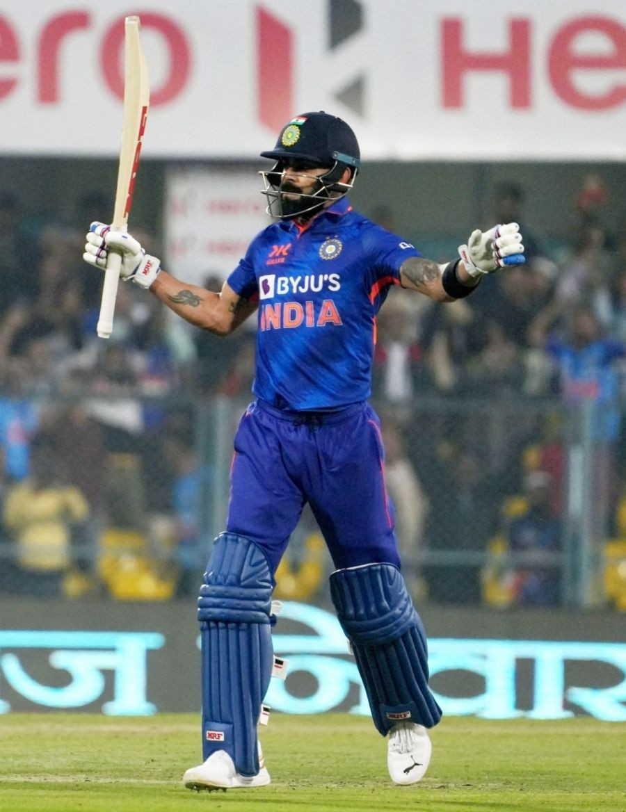 Guwahati:India's Virat Kohli rises his bat as he celebrates after scoring a century during the first one-day international cricket match between India and Sri Lanka in Guwahati, India, Tuesday, Jan. 10, 2023.(Photo: Anuwar hazarika/IANS)