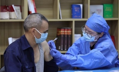 Chinese flock to Hong Kong, Macau to get private Covid booster shots