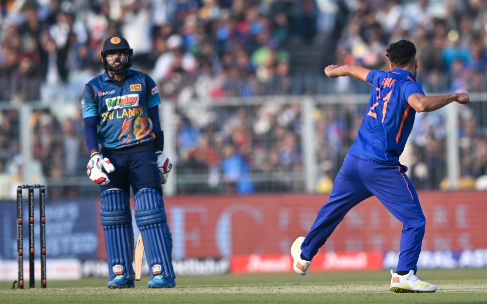 Kolkata:India's Umran Malik, celebrates after the taking wicket of Sri Lanka's Wanindu Hasaranga de Silva during the second one-day international cricket match between India and Sri Lanka in Kolkata, India, Thursday, Jan. 12, 2023.(Photo:Abhijit Addya/IANS)