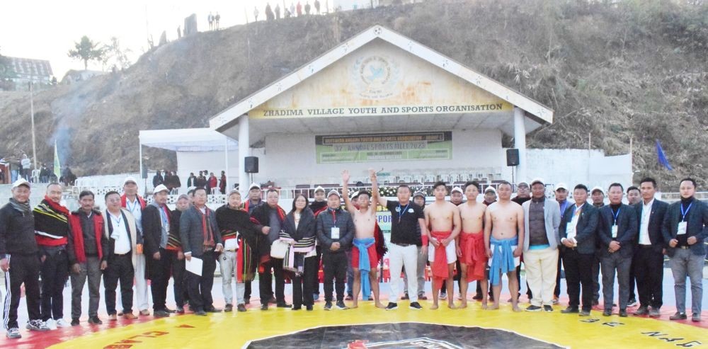 Winners of NAYSA-C wrestling meet with dignitaries.