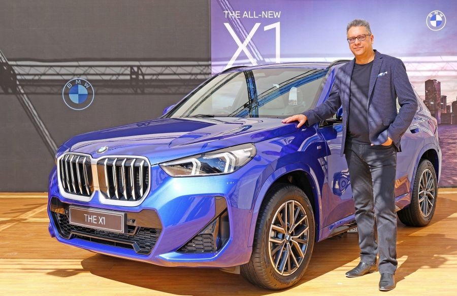 Bengaluru: BMW Group India President Vikram Pawah poses with the newly launched BMW X1 SUV, in Bengaluru on Saturday, January 28, 2023. (Photo:IANS)