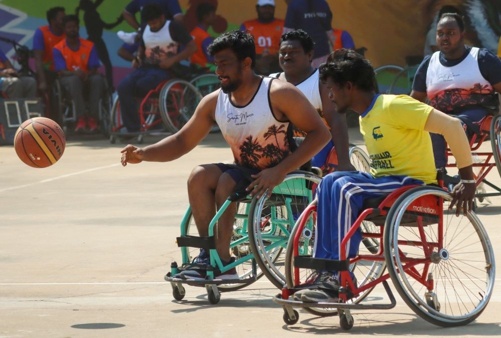 Chennai : Wheelchair-bound sportspersons played basketball during the 20th year Tamil Nadu state level sports meet for differently abled persons at SDAT Nehru Park Complex in Chennai on Saturday, Feb. 25, 2022. (Photo: R. Parthibhan/IANS)