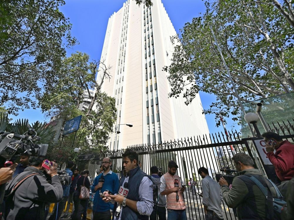 New Delhi: Media persons stand outside the office of BBC during a raid by the Income Tax authorities in New Delhi on Tuesday, Feb. 14, 2023. (Photo: Anupam Gautam/IANS)