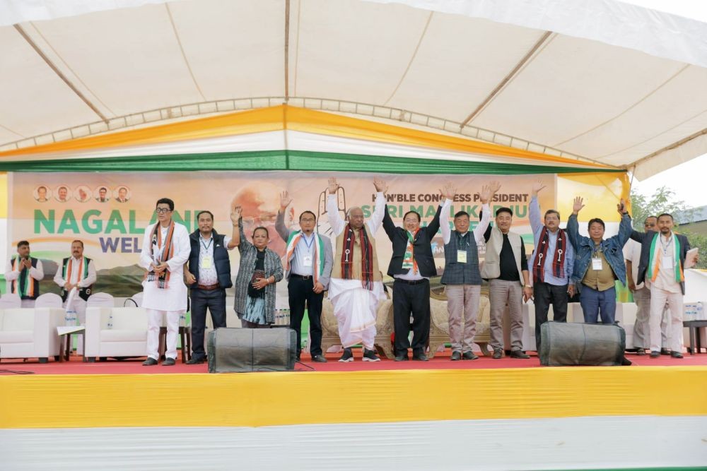 INC President Mallikarjun Kharge with INC candidates and senior Congress leaders at the public rally in Diphupar village ground on February 21.