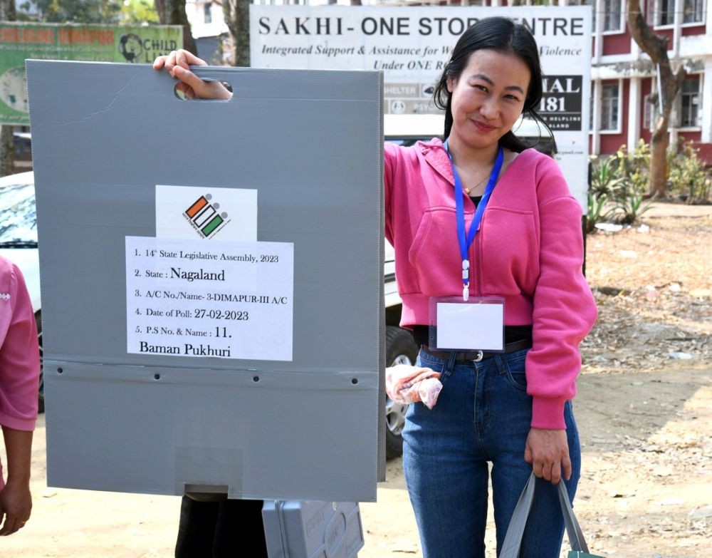 Dimapur: Women polling officials with electronic voting machine (EVM) and other election materials head towards their respective polling stations for the Meghalaya Assembly elections 2023, in Dimapur, Nagaland on Sunday, February 26, 2023.(Photo:IANS/Twitter)