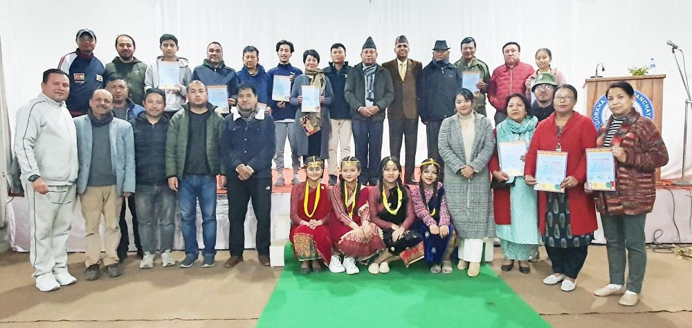 Winners of Gorkha TT tournament along with Col Umesh Kumar Sati along with officials of Gorkha Panchayat, Youth and Students bodies.