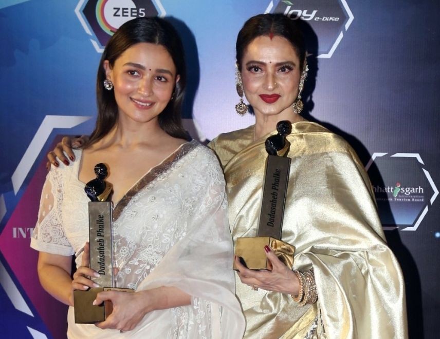 Mumbai: Bollywood actresses Rekha and Alia Bhatt pose with awards for a photograph during the Dadasaheb Phalke International Film Festival Awards 2023, in Mumbai on Tuesday, Feb. 21, 2023. (Photo: Sanjay Tiwari/IANS)