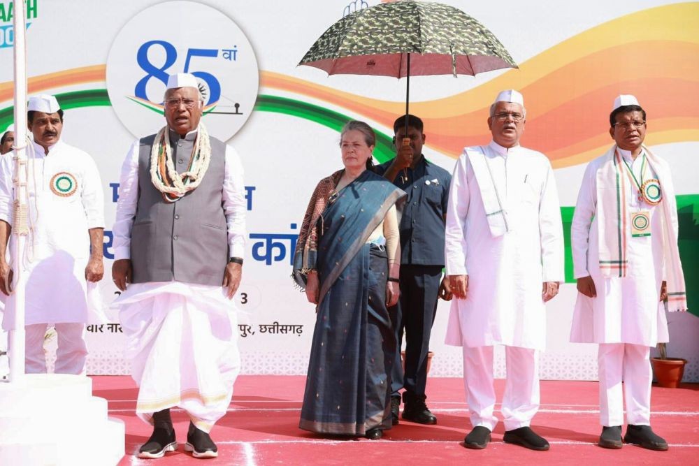 Raipur : Congress National President Mallikarjun Kharge and Party leader Sonia Gandhi unfurls the national flag during the 2nd day of Congress' 85th Plenary Session in Raipur on Saturday, Feb 25, 2023.(Photo:IANS)