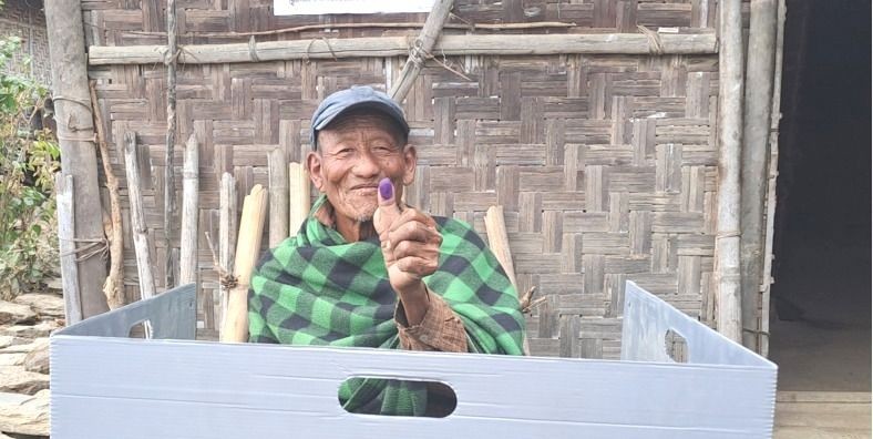 An elderly voter casts his vote through postal ballot at Mishilimi village under 13th Pughoboto Assembly Constituency on February 21. Nagaland state will go to poll for the 14th NLA on February 27. (DIPR Photo)