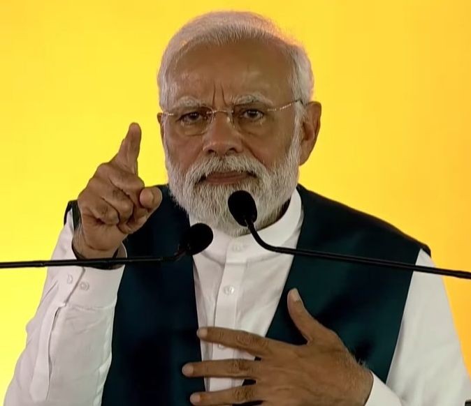 Davanagere : Prime Minister Narendra Modi addressing a public rally in Davanagere on Saturday, March 25, 2023. (Photo:IANS)