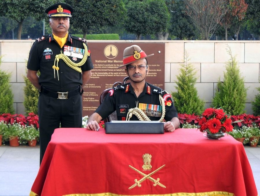 Newly appointed Vice Chief of Army Staff Lieutenant General MV Suchindra Kumar signs 'Visitors Book' at National War memorial on assumption of charge, in New Delhi on Wednesday, March 1, 2023. (IANS Photo)