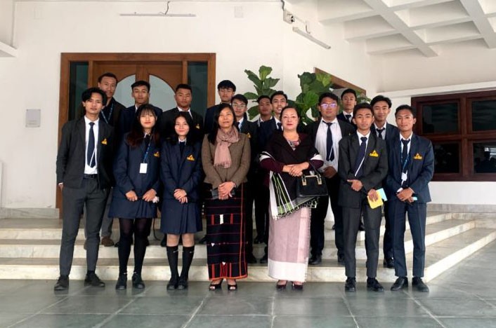 Students and staff from Department of Political Science, Tetso College with Salhoutuonuo Kruse, Minister for Women Resource Development and Horticulture and Hekhani Jakhalu, Advisor Industries and Commerce at Nagaland Legislative Assembly Complex in Kohima after attending the ongoing session of the NLA on March 27. The students attended the session as part of educational trip for practical learning.
