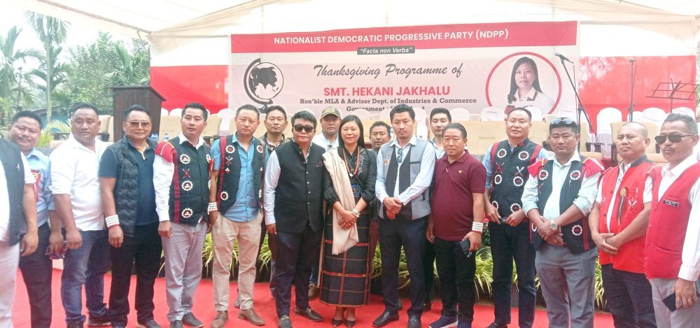 Advisor for Industries and Commerce with family and leaders of frontal organisations of the 3 Dimapur-III Assembly seat in Toluvi village, Dimapur on March 11. (Morung Photo)