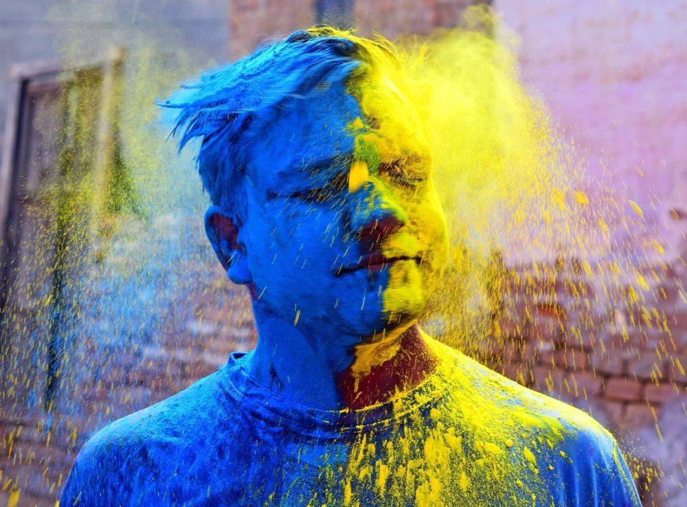Bikaner: A man smeared in colour celebrates Holi festival, in Bikaner on Tuesday, March 07, 2023.  (Photo: Dinesh Gupta/IANS)