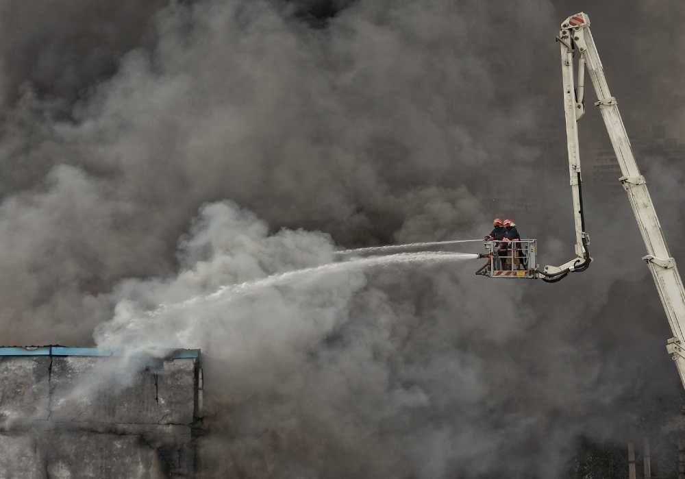 New Delhi: Firefighters try to douse the fire after it caught fire in a factory in Wazirpur Industrial Area, in New Delhi on Friday, March 31, 2023. (Photo:IANS/Anupam Gautam)