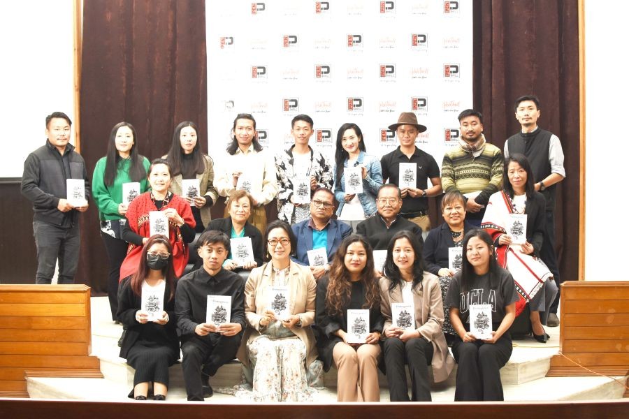 Charles Chasie, Author & Independent Researcher (3rd from R, second row) seen with the Editors of the book- Sentinaro (Left, 2nd row) and Vizovono Elizabeth (2nd from R, second row) along with some of the contributors whose works are featured in the anthology.