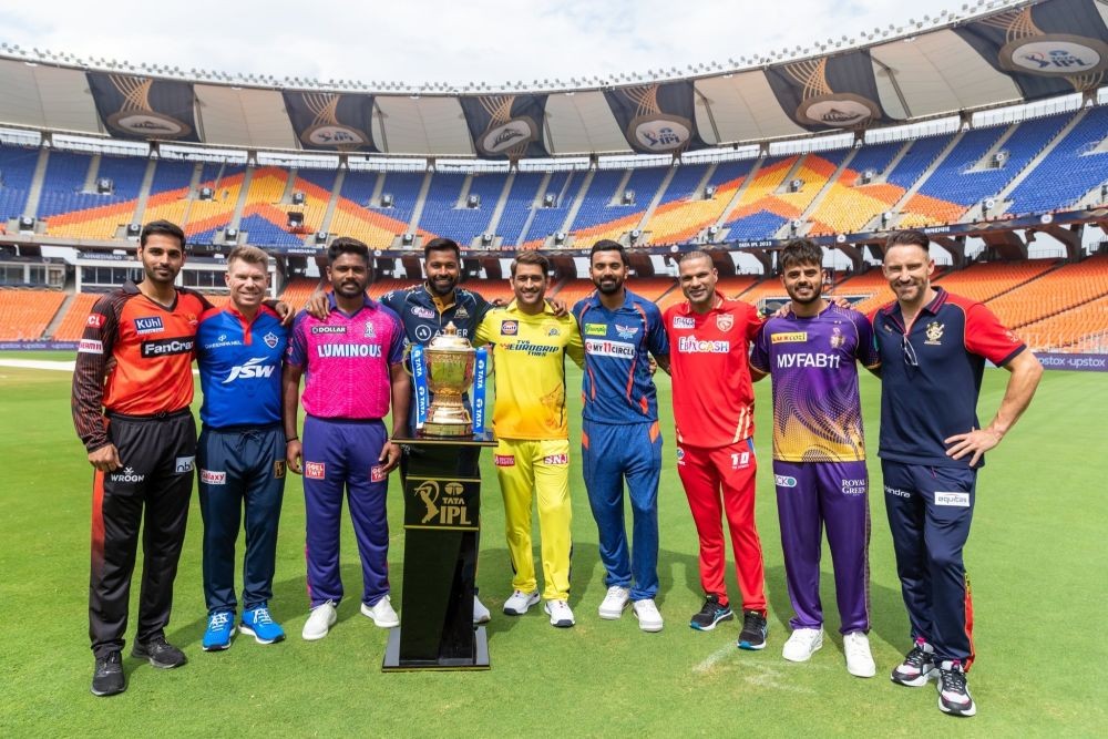 Ahmedabad :  From (L-R) Team captains Bhuvneshwar Kumar, David Warner, Sanju Samson, Hardik Pandya, MS Dhoni, KL Rahul, Shikhar Dhawan, Nitish Rana, and Faf du Plessis pose with the IPL trophy ahead of the Indian Premier League 2023 at Narendra Modi Stadium in Ahmedabad on March 30, 2023. (Photo:IANS)
