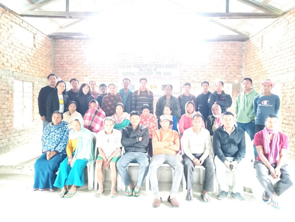 Resource persons and village elders at Hazadisa Community Hall on March 20.