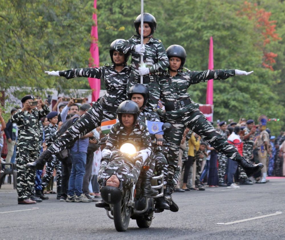Bhopal: Central Reserve Police Force (CRPF) women perform in a daredevil show during  CRPF women bikers rally, in Bhopal on Thursday, March 16, 2023. (Photo:IANS/Hukum Verma)