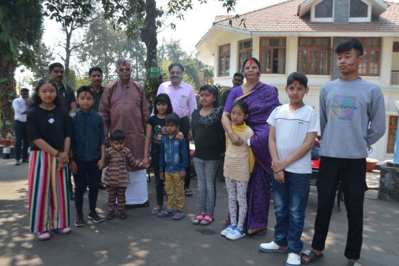 Governor of Nagaland, La. Ganesan celebrating Holi with children at Raj Bhavan Kohima on March 8. Officers and staff along with families, Security personnel - Assam Rifles, CPT and special branch attached to Raj Bhavan attended the celebration. (Photo Courtesy: PRO Raj Bhavan)