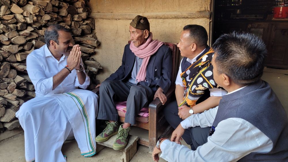 Union Minister of State Dr Murugan interacts with Vezo Swuro during a visit to Chesezu in Phek district on April 22. (Morung Photo)