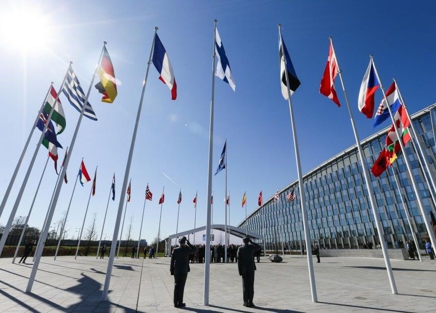 Delegates attend a ceremony for Finland's accession to NATO at the NATO headquarters in Brussels, Belgium, April 4, 2023. Finland on Tuesday formally became the 31st member state of the North Atlantic Treaty Organization (NATO), ending its military non-alignment in the fastest accession procedure in record time. (Xinhua/Zheng Huansong)