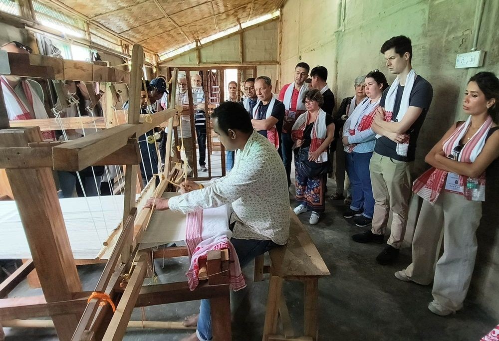 Guwahati: G20 delegates visit Sualkuchi village, which is the center of Assam’s textile production at Kamrup district of Assam on Monday, April 3, 2023. (Photo: Anuwar hazarika/IANS)