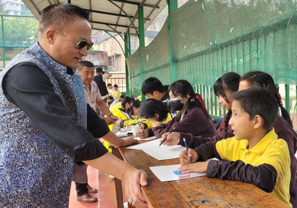 TaFMA Chairman, Theja Meru interacts with participants during the World Art Day in Kohima on April 15.