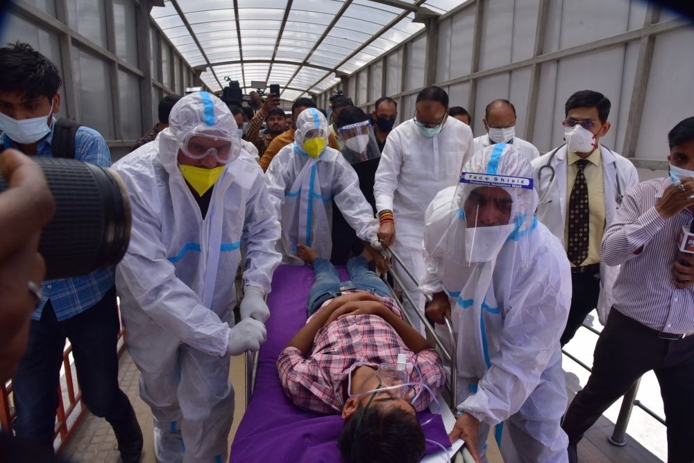 Lucknow: Healthcare workers during a mock drill to check COVID-19 preparedness amid rising cases of coronavirus at RML Hospital in Lucknow on Tuesday, April 11, 2023. (Photo: Phool Chandra/IANS)
